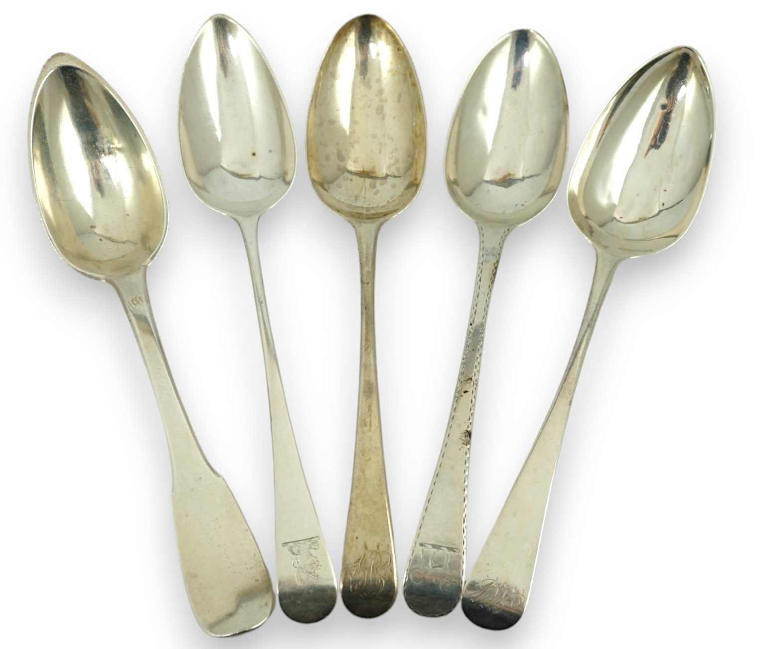 A harlequin collection of 18th and mainly 19th century silver Old English pattern table spoons, various dates and makers, forty five items, together with five similar fiddle pattern table spoons and two French white meta